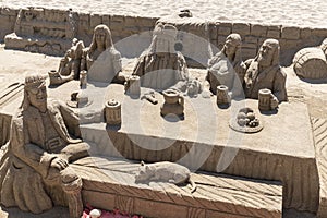 Funny sand sculpture at the beach Fuengirola Spain photo